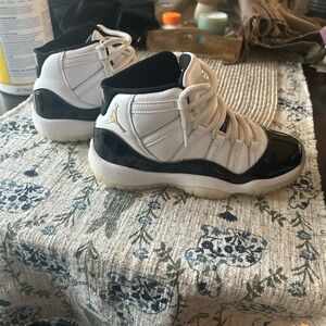 Air Jordan 11 Retro White and Black Sneakers